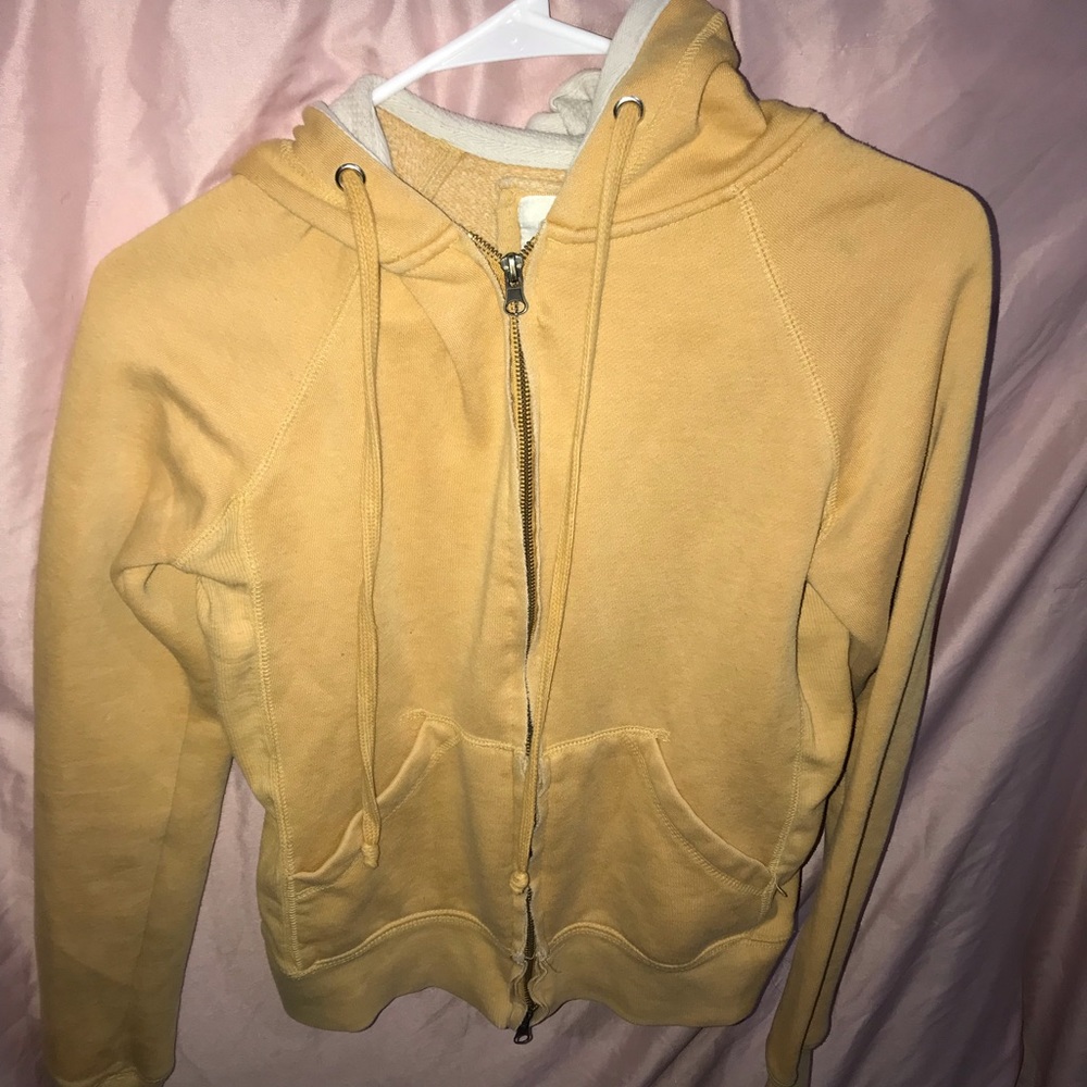 Yellow sweater. Size small . Lightly washed